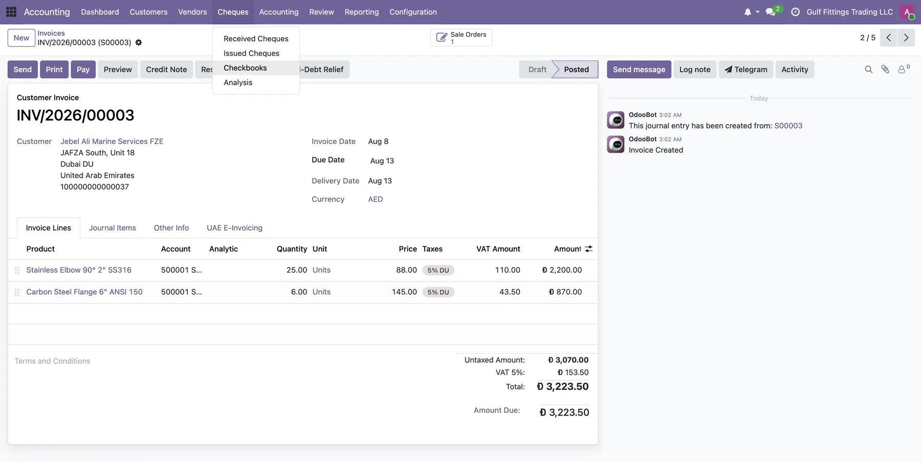Odoo customer invoice in AED showing the official Dirham symbol on every amount, a UAE E-Invoicing tab, five percent VAT lines, and the cheques menu with received cheques, issued cheques and checkbooks.